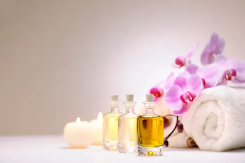 Aromatherapy oil bottle with candle light -selective focus- XXXL image Aromatherapy oil bottle with candle light -selective focus- XXXL image